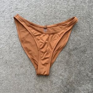 Skims Signature Swim Cheeky Tanga Bottoms Almond